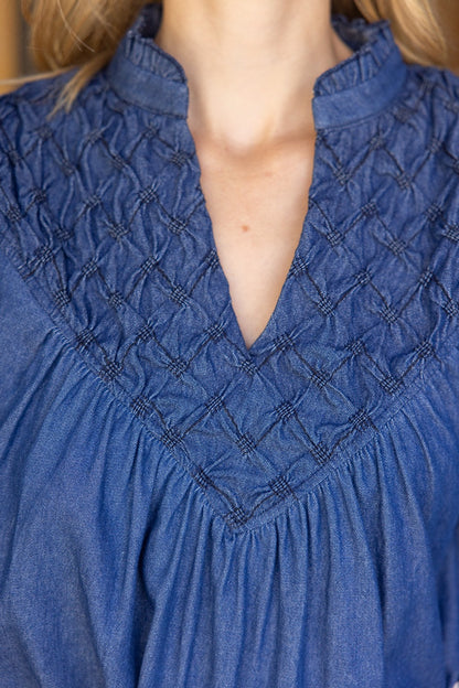Diamond Textured Yoke Puff Sleeve Top: blue, diamond-stitched yoke, split V neckline. Available in XS–XL.