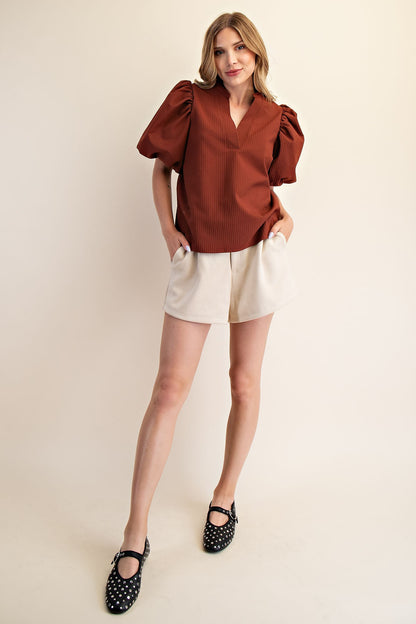 Rachel V-Neck Puff Sleeve Top in brown, available in sizes XS-XL.