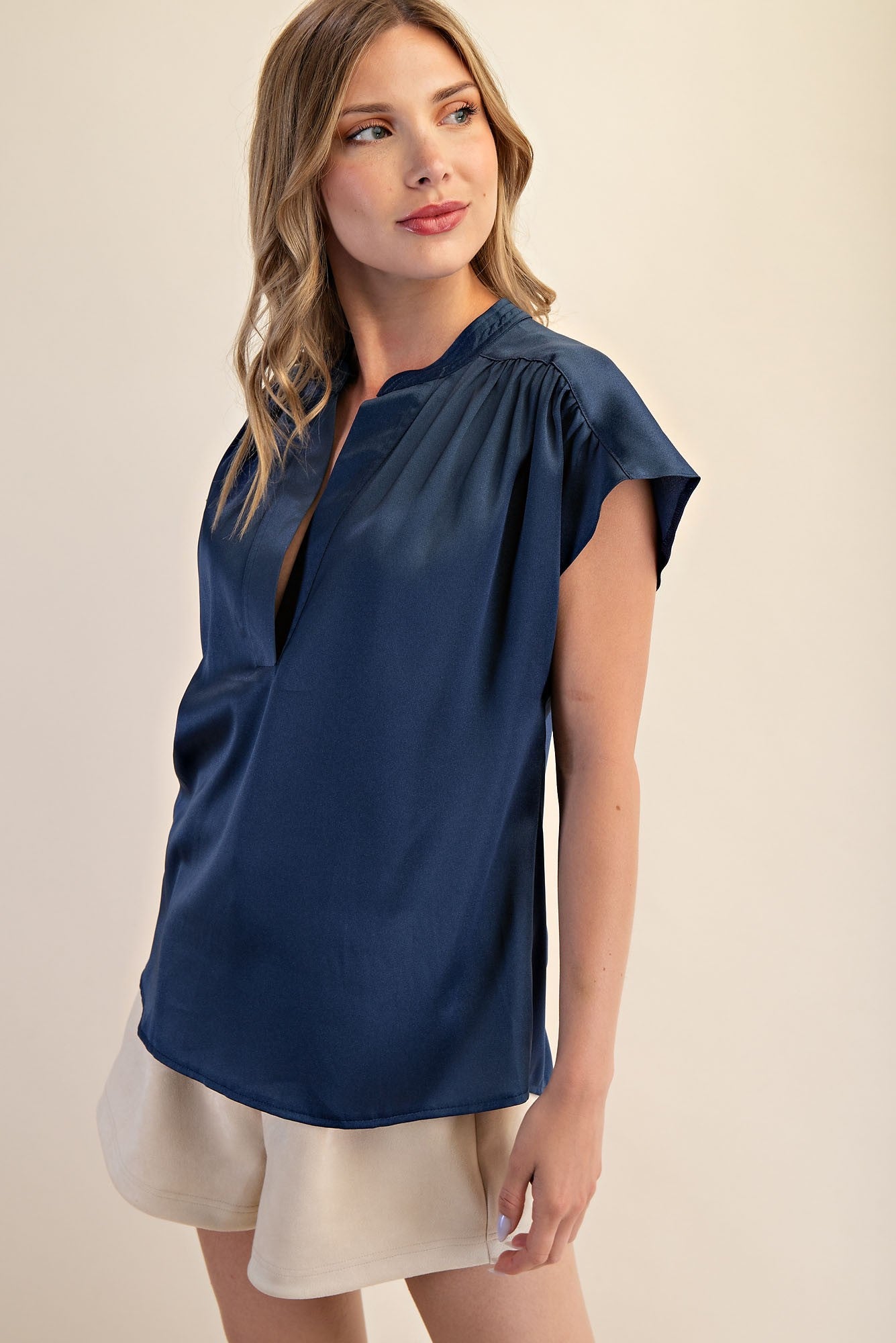 Jami Drop Cap Sleeve Satin Blouse in navy blue, cap sleeves, satin finish. Available in sizes XS-XL.