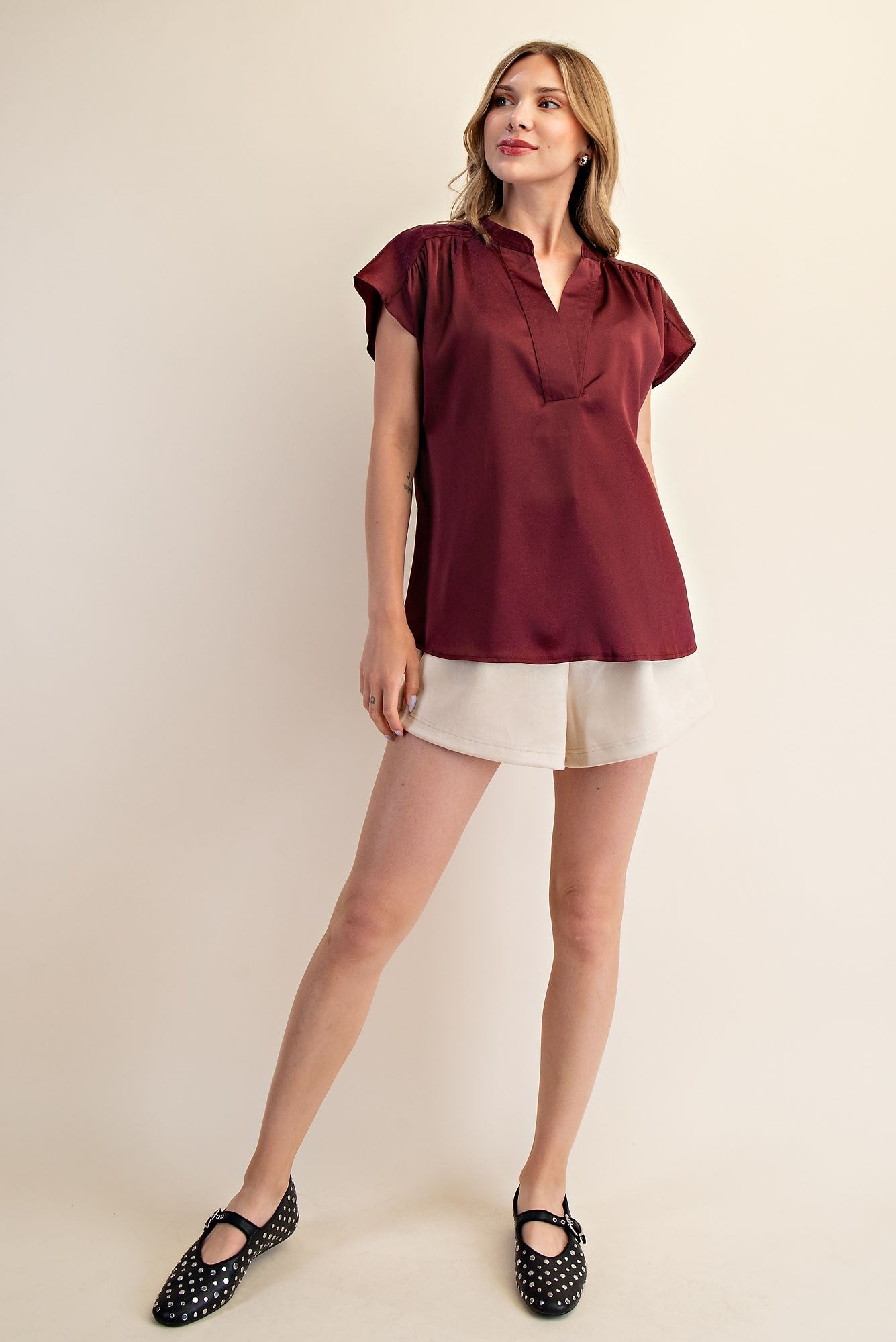 Jami Drop Cap Sleeve Satin Blouse in maroon. Available sizes: XS–XL.