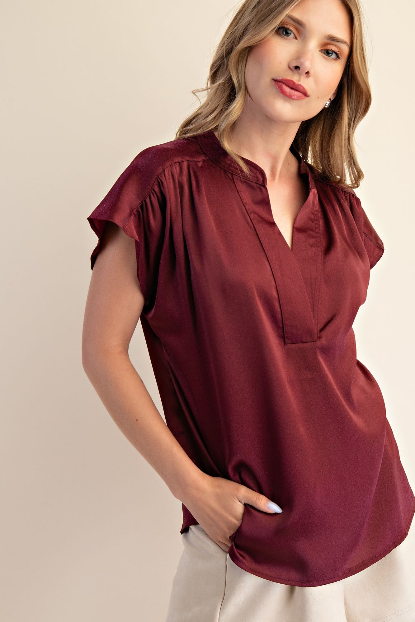 Jami Drop Cap Sleeve Satin Blouse in burgundy, split neckline, relaxed fit. Sizes: XS-XL.