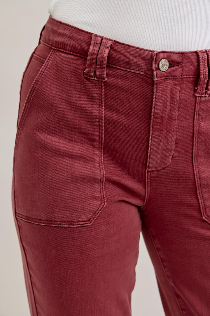 Judy Blue HW Aurora Weekender Jeans in brick red with patch pockets, belt loops, silver button. Available in sizes 0-24.