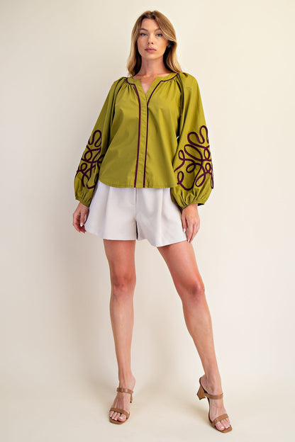 Veronica Soutache Detail Blouse in light green with balloon sleeves, available in sizes XS-XL.