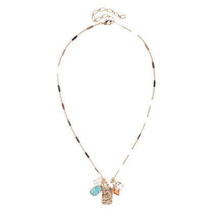 Gold Leah Necklace: delicate layered chain with black beads, 4 pendants. Adjustable length. Available in S, M, L sizes.