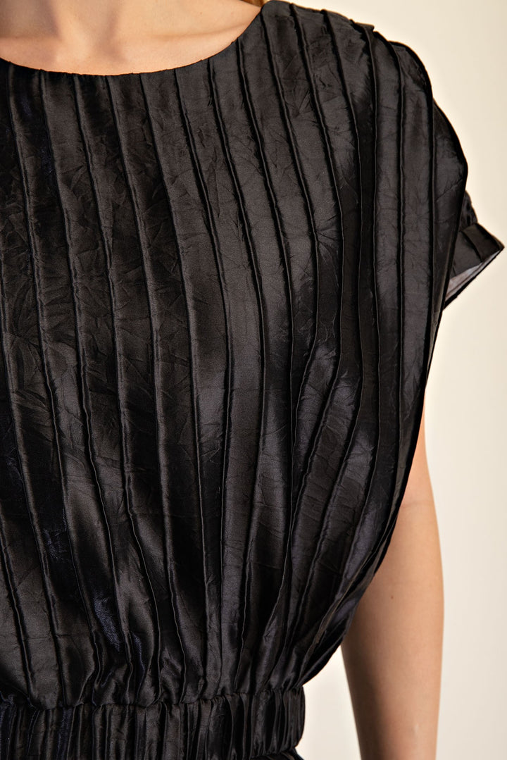 Pitch Flowy Cropped Blouse: shimmery black, short sleeves, gathered waist. Sizes XS–XL available.