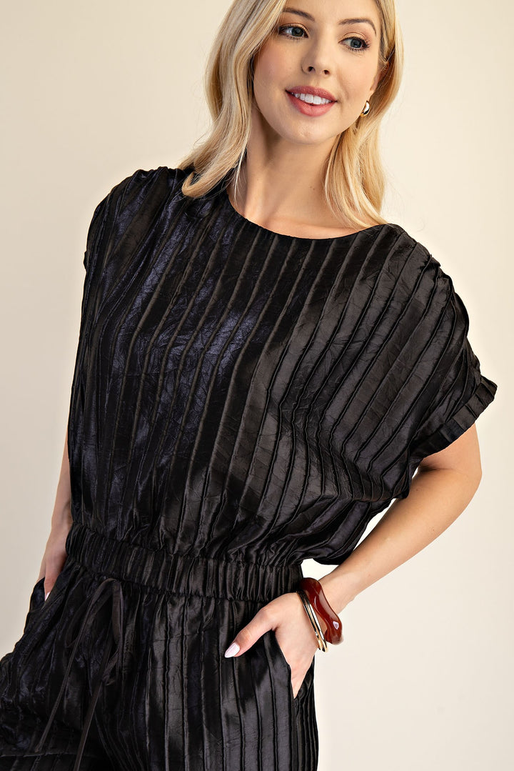 Pitch Flowy Cropped Blouse: shimmery black, pleated, short sleeves. Available in XS-XL.