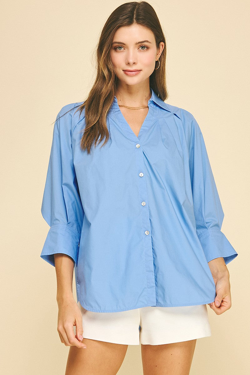 French Blue V-Neck Collar Wide Cuff Shirt: loose, 100% cotton, light blue, wide three-quarter sleeves. Sizes XS–XL.