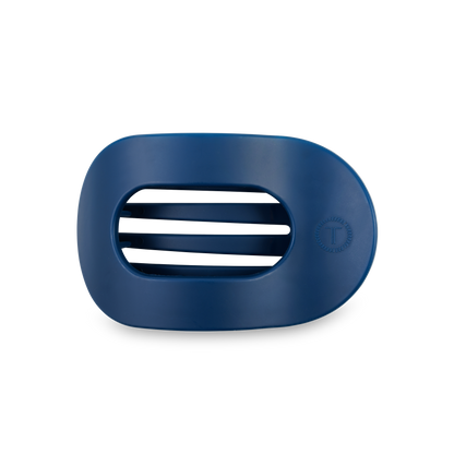 Dark blue oval plastic soap dish with three center slots and a "T" logo. Available in small and large sizes.