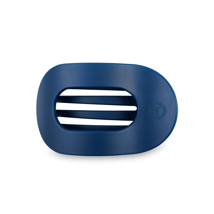 Dark blue oval plastic soap dish with three center slots and a "T" logo. Available in small and large sizes.
