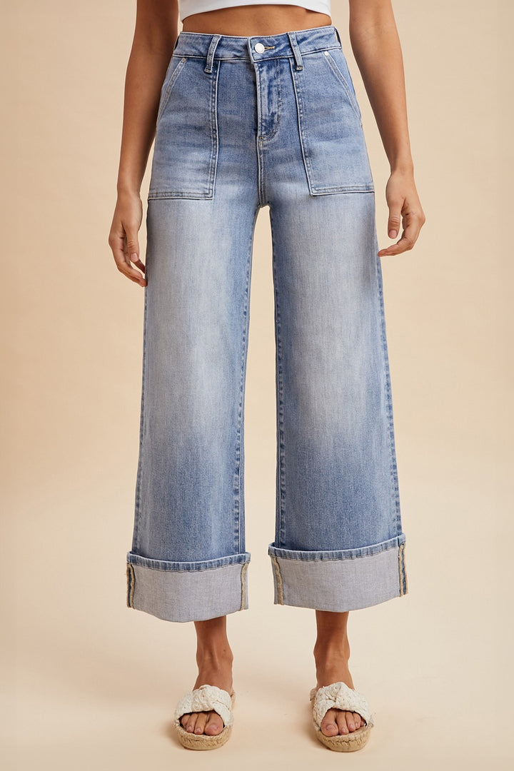 Comfort Stretch Wide Leg Cuff Jeans: high-waisted, light-wash, large front pockets, wide cuffs. Sizes: 24–32.