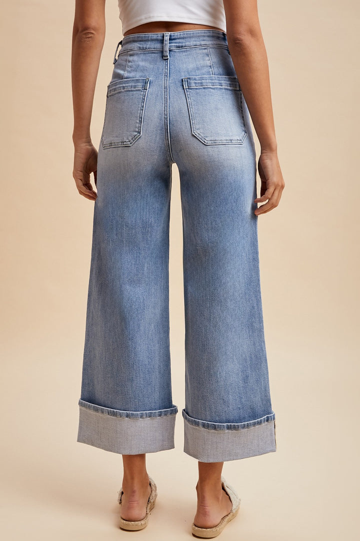 Light blue Comfort Stretch Wide Leg Cuff Jeans with large cuffs and back pockets. Available in sizes 24–32.