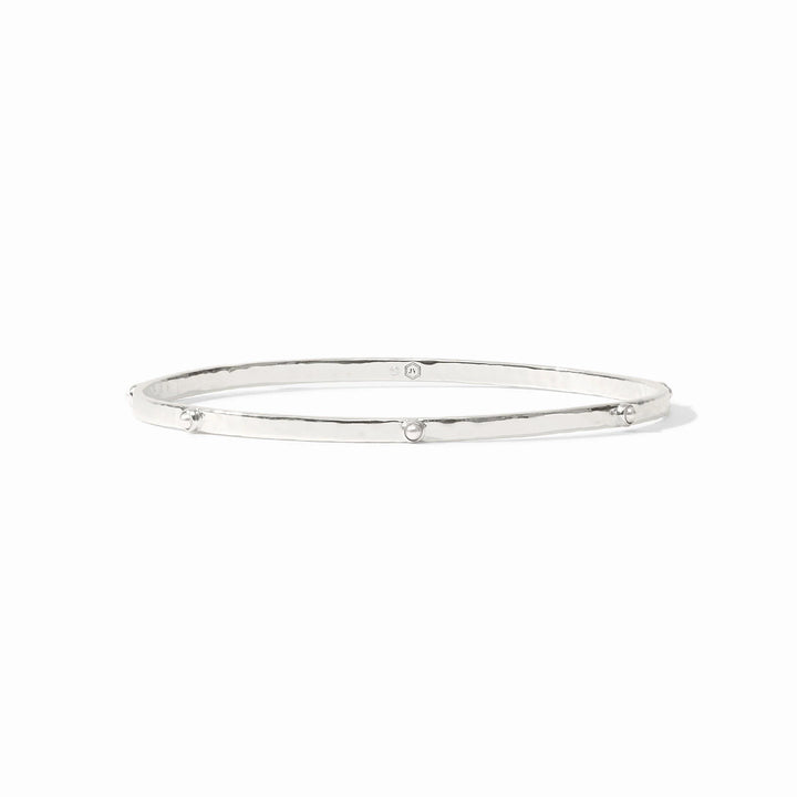 Thin, pure silver Crescent Stone Bangle with slight irregularity and small stud accents. Available in S, M, L sizes.