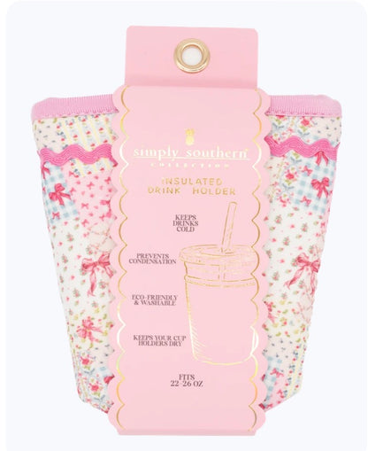 Pink Quilted Ribbon Insulated Drink Holder with pastel floral pattern and pink scalloped tag reading “simply southern insulated drink holder.” Reusable, eco-friendly, washable, prevents condensation. Available in multiple sizes.