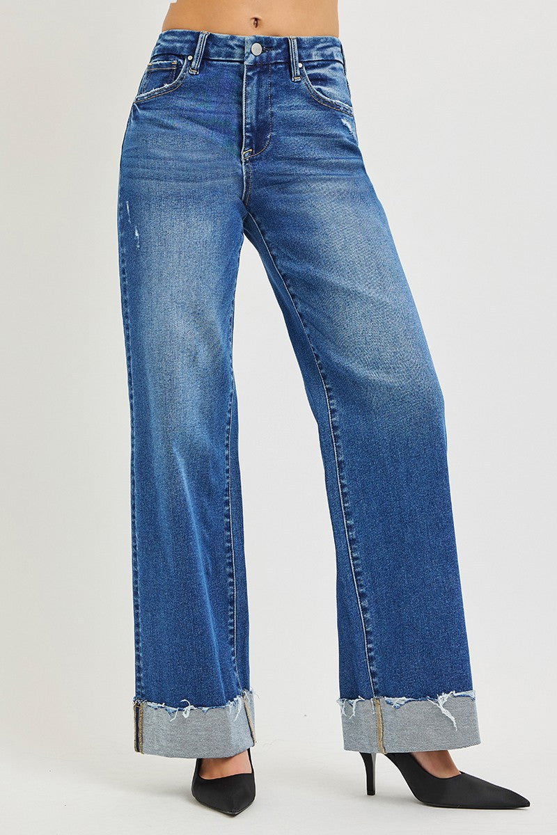 Risen High Rise Wide Leg Jeans with cuffed hems, slight distressing, large cuffs. Available in sizes S-XL.