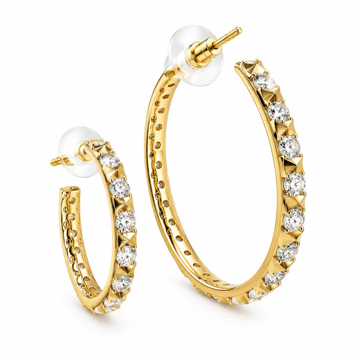 Fate Hoop Earring White CZ gold hoops with clear round gemstones, studded accents, sculptural spikes, and clear plastic backings. Sizes available: small, medium, large.