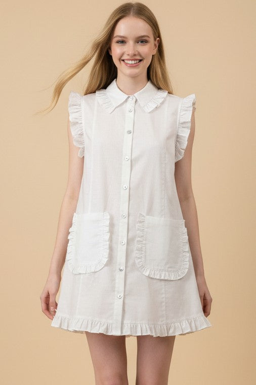 Ivory ruffled sleeveless shirt dress, A-line cotton-linen blend with ruffle trim and two front pockets. Sizes XS–XL.