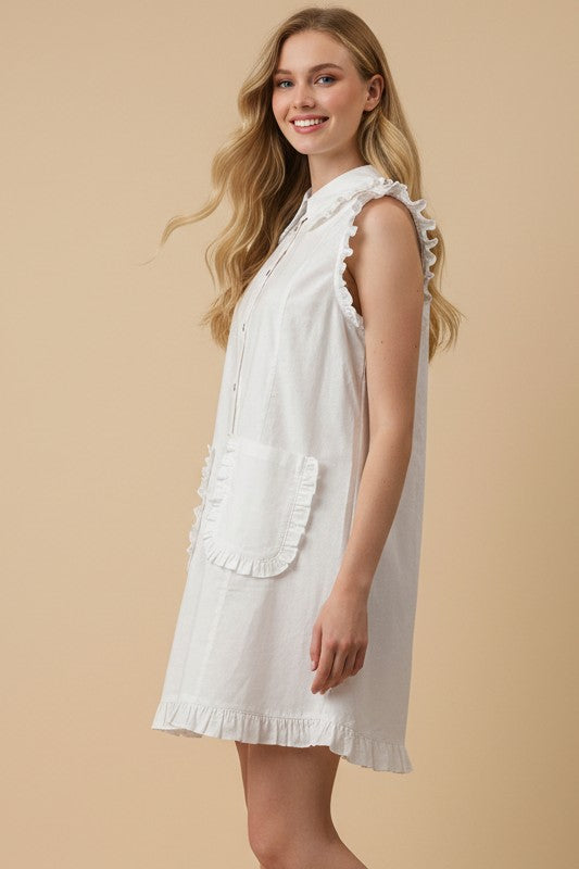 Ivory Ruffled Sleeveless Shirt Dress with ruffle details, large front pocket, cotton-linen blend. Available in sizes XS-XL.