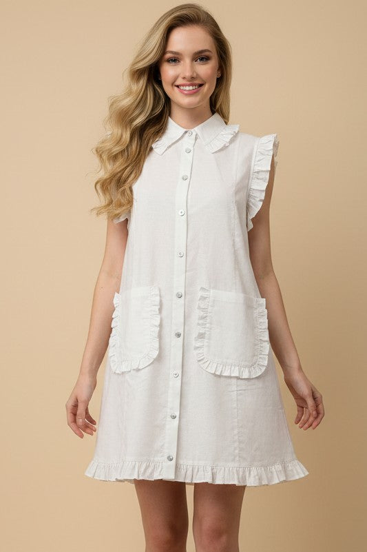 Ivory Ruffled Sleeveless Shirt Dress with A-line silhouette, ruffled trim, front pockets. Available in sizes XS-XL.