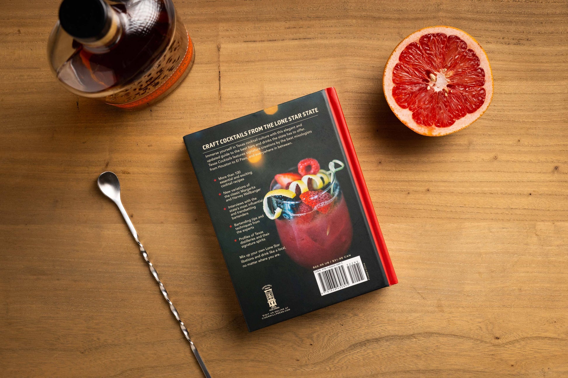 Texas Cocktails (Second Edition) book, available in standard hardcover size, features Texas-inspired drinks on the back cover.