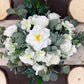 A floral arrangement featuring lifelike Artificial Real Touch Orlane Rose-15" Long: Pure White, peonies, and lilies with green leaves and stems. Size available: 15".