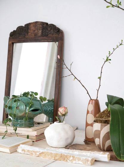 Wooden-framed mirror available in small, medium, and large sizes.