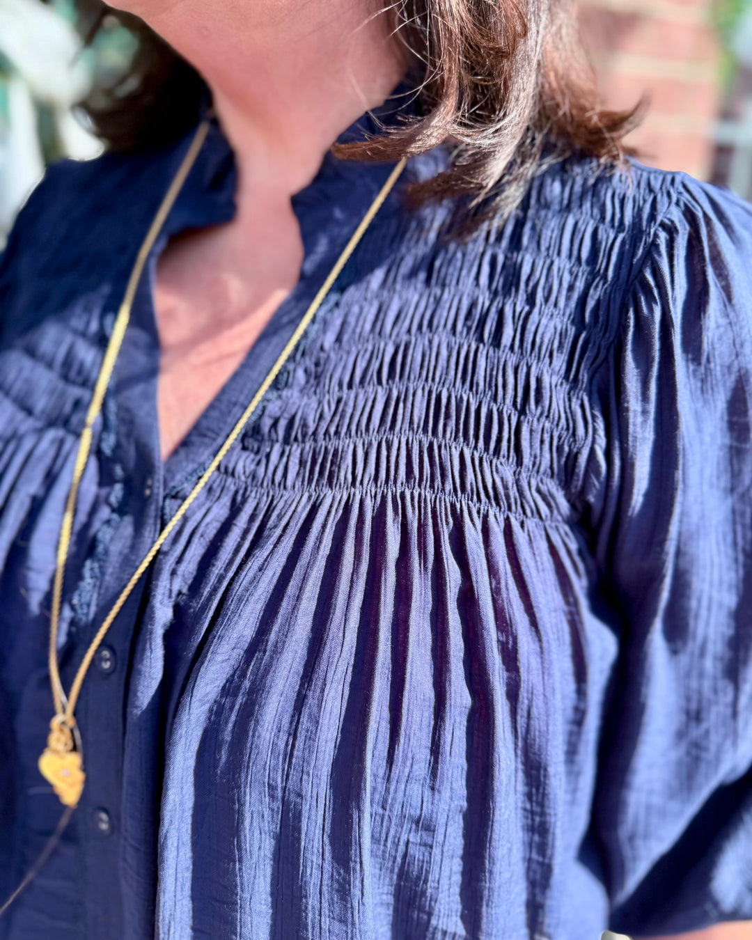 Navy Smocked Yoke Button Front Blouse, available in sizes XS-XL.