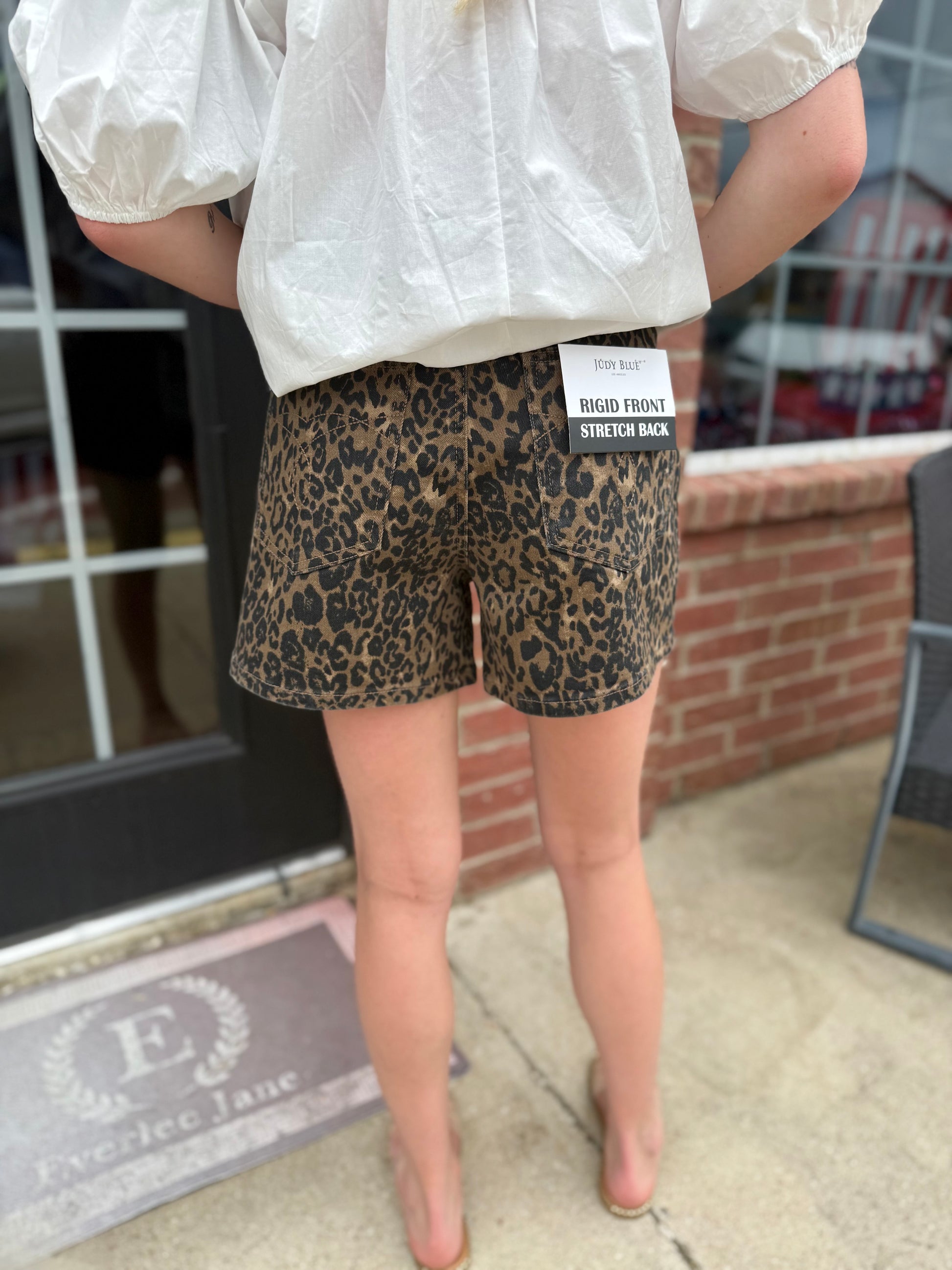 Judy Blue HW Cut Off Leopard Print Shorts, trendy summer style. Available in sizes S-XL.