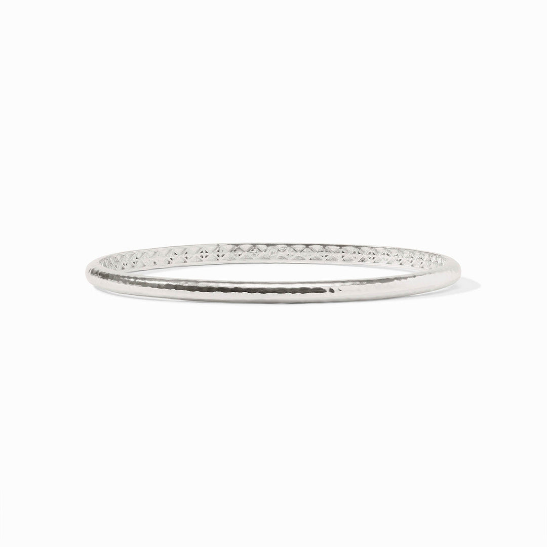 The Havana Demi Bangle Silver is a round, silver-plated bangle with a hammered texture. Available in size M.