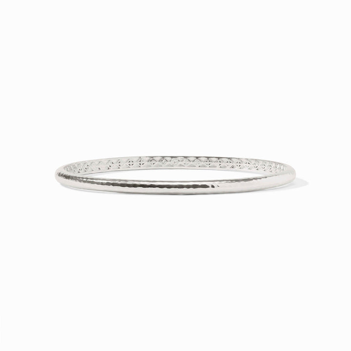 The Havana Demi Bangle Silver is a round, silver-plated bangle with a hammered texture. Available in size M.
