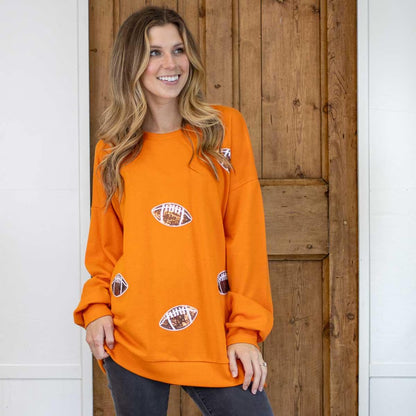 Football Queen Sequin Sweatshirt in orange with sparkling graphics; available in sizes S-XL.