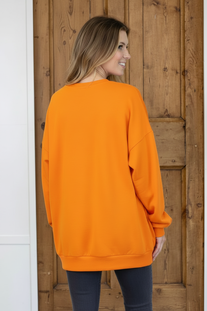 Orange Football Queen Sequin Sweatshirt with bold sequins. Available in sizes S-XXL.