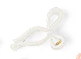 White bow-shaped ribbon claw clip with gold accent near clasp; available in small and large sizes.