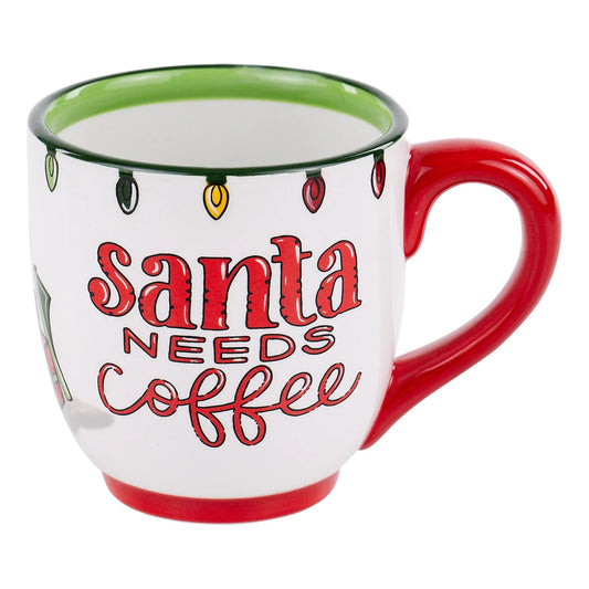 Forget Milk Santa Needs Coffee Mug: Festive Christmas cup with red handle and rim, colorful light designs, "Santa Needs Coffee" in bold red script, cheerful green interior. Sizes: 11 oz, 15 oz.