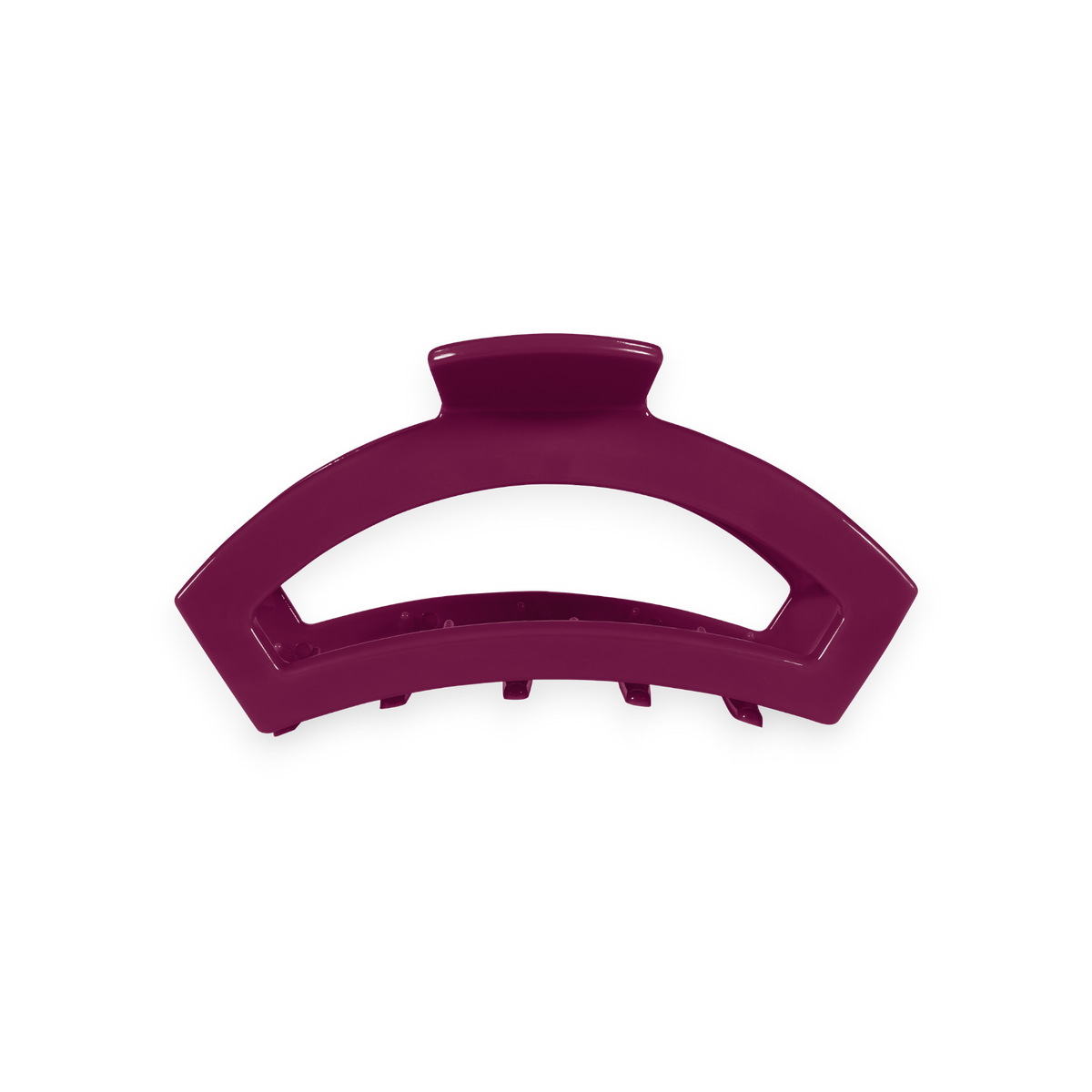 Geometric, arc-shaped hair clip in berry purple with short teeth along the bottom; available in size small.