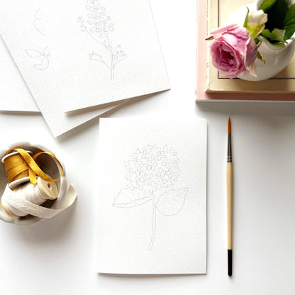 Set of 8 Garden Flowers Paintable Notecards, concise and paintable. Sizes: standard card size.