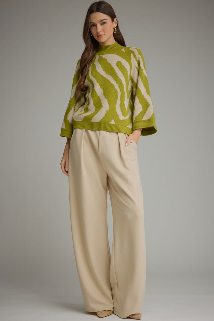 Lime green and beige zebra print mock neck sweater with wide sleeves. Available in all sizes.