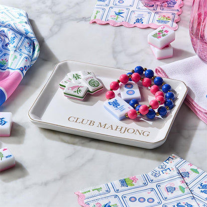 Mahjong Beaded Stretch Bracelet, vibrant and colorful, displayed in a tray labeled “CLUB MAHJONG.” Sizes available: stretch to fit most wrists.