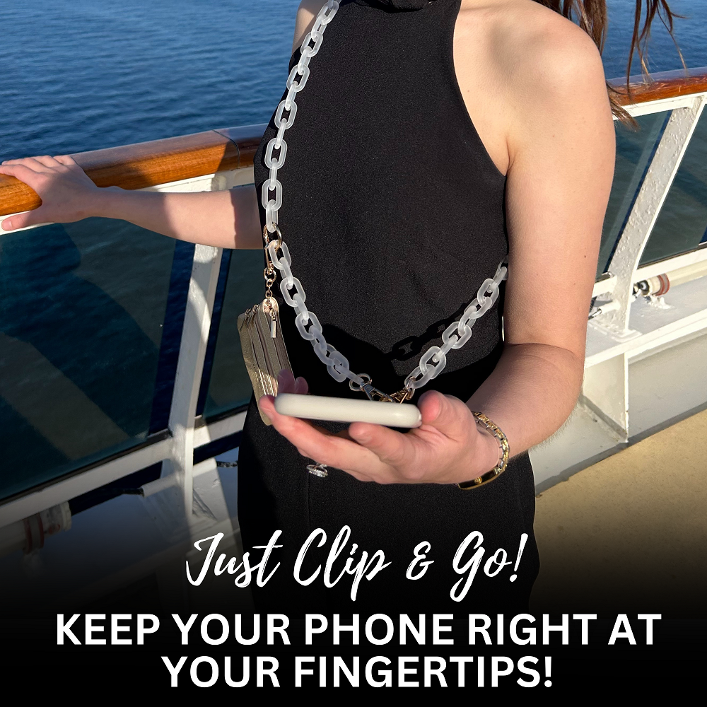 Save the Girls Clip and Go Zippered Pouch shown clipped on shoulder. Available sizes: small, medium, large.