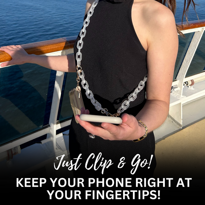 Save the Girls Clip and Go Zippered Pouch shown clipped on shoulder. Available sizes: small, medium, large.