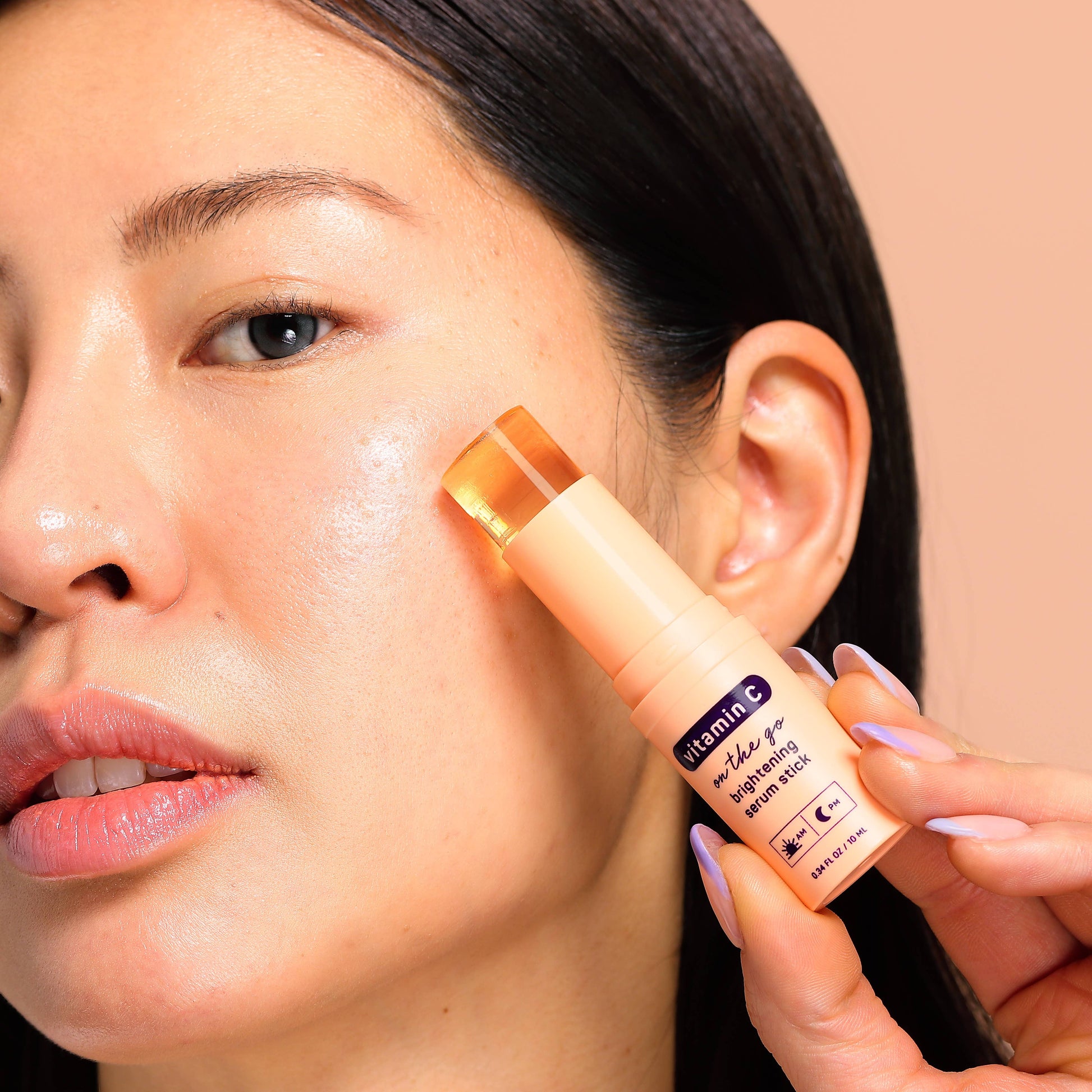 Glow Vitamin C Brightening Face Serum Stick with visible product label. Available in 10g and 25g sizes.