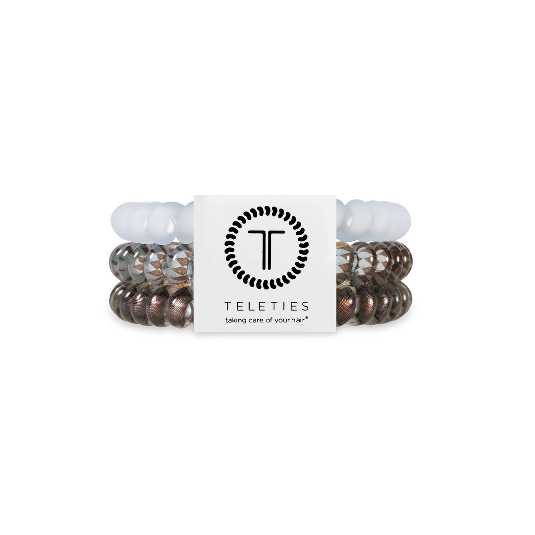 TELETIES Hair Ties in neutral shades, chic coils, white label with logo and slogan. Available in small, medium, large sizes.