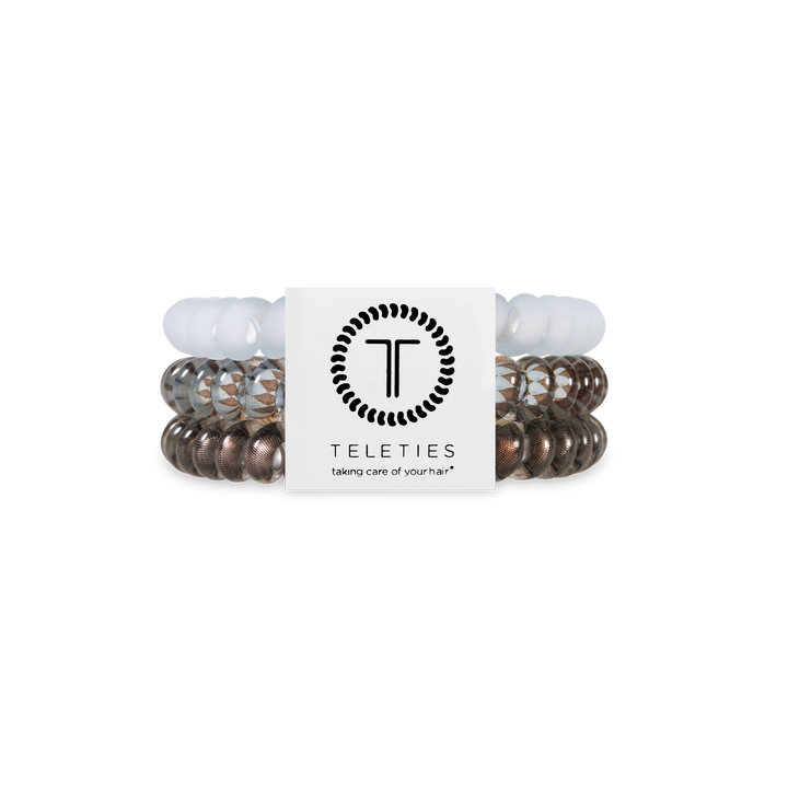 TELETIES Hair Ties in neutral shades, chic coils, white label with logo and slogan. Available in small, medium, large sizes.