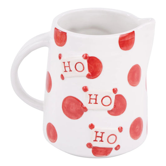 The Santa Ho Ho Ho Pitcher is a ceramic jug with red polka dots on a white background and "HO" repeated three times in red. Available size: not specified.