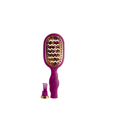 The Mini Vented Hair Brush - Mulberry features a wavy, vibrant purple body with gold bristles; available in mini size for detangling and styling.