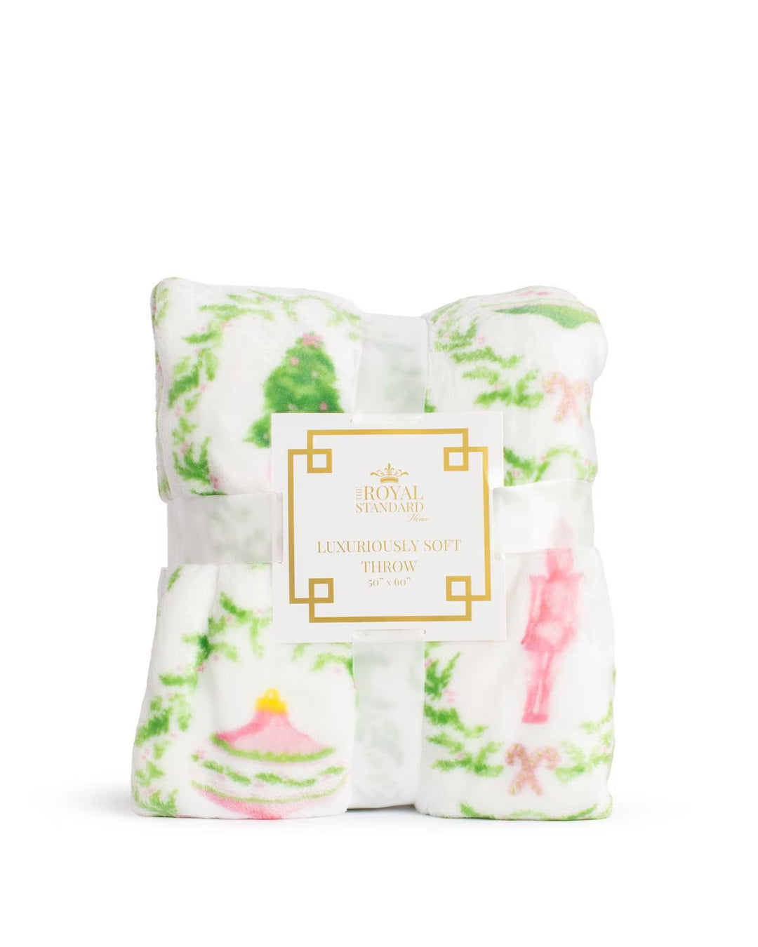 White Nutcracker Trellis throw blanket with green trellis, nutcracker, and Christmas tree motifs.