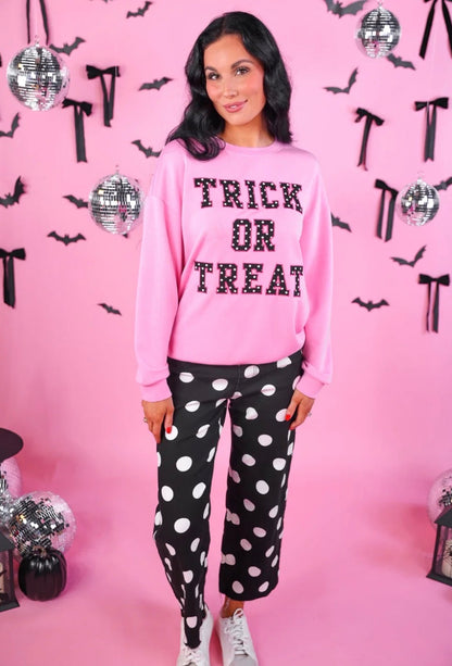 Trick or Treat Polka Dot Pullover featuring a festive polka dot pattern; available in sizes XS–XXL.