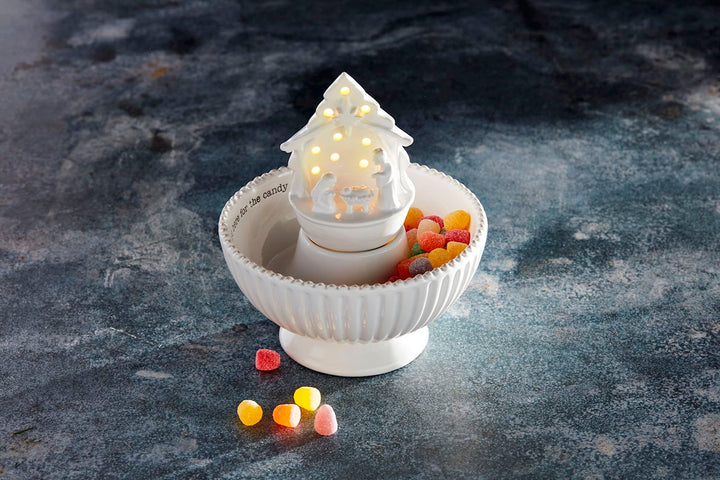 White ceramic Light-Up Nativity Sitter bowl with LED centerpiece and “here for the candy” text.