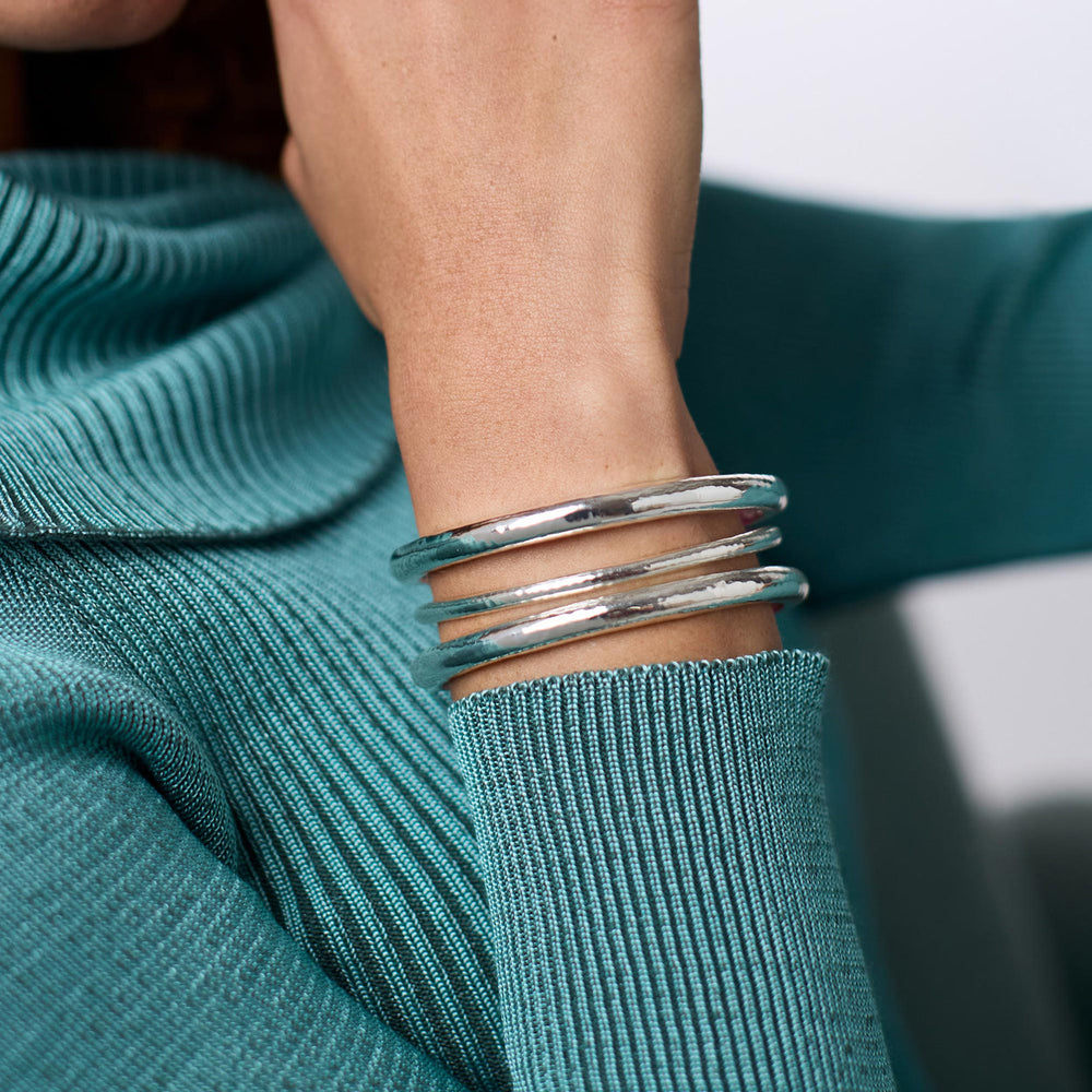 Havana Demi Bangle Silver shown stacked on wrist; size M, also available in S and L.