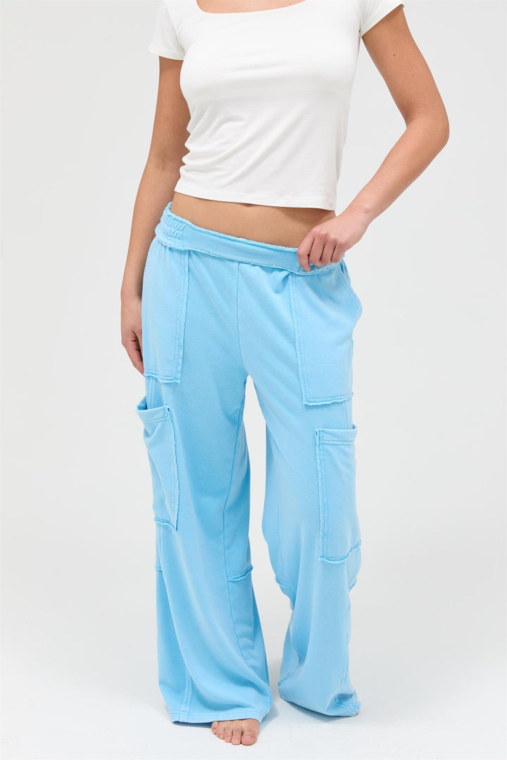 Light blue Mineral Wash Wide Leg Cargo Pants with large pockets. Available in S, M, L, and XL.