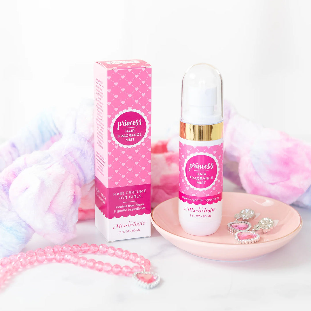 Pink bottle and box of Hair Fragrance Mist. Lightweight; keeps hair fresh. Available in 50ml and 100ml sizes.